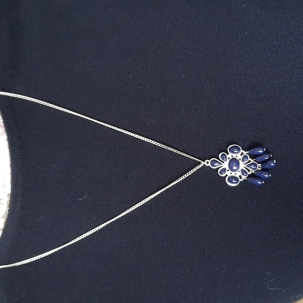 Silver necklace with black pendant